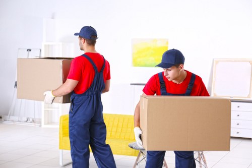 Flat removal team planning a move in a Dulwich apartment building