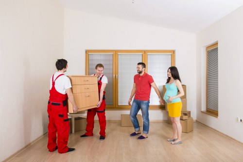 Removal van and moving boxes outside a Dulwich residential property