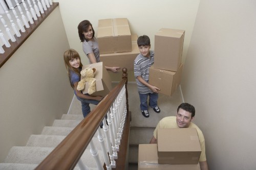 Packers and movers handling furniture carefully during a Dulwich relocation
